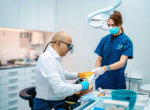 Dr. Prashanth fixing a chipped tooth of a patient