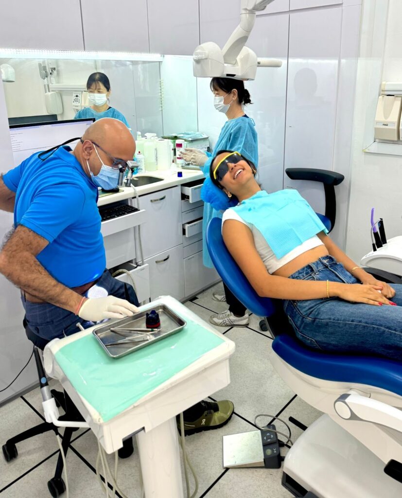 Professional teeth whitening session with Dr. Prashanth
